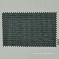 tela de lana merino peinada en verde y azul oscuro para un traje a medida
